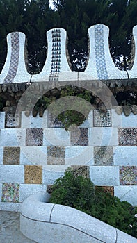 Park Guell in Barcelona, Ã¢â¬â¹Ã¢â¬â¹a wall with ceramic tiles. photo